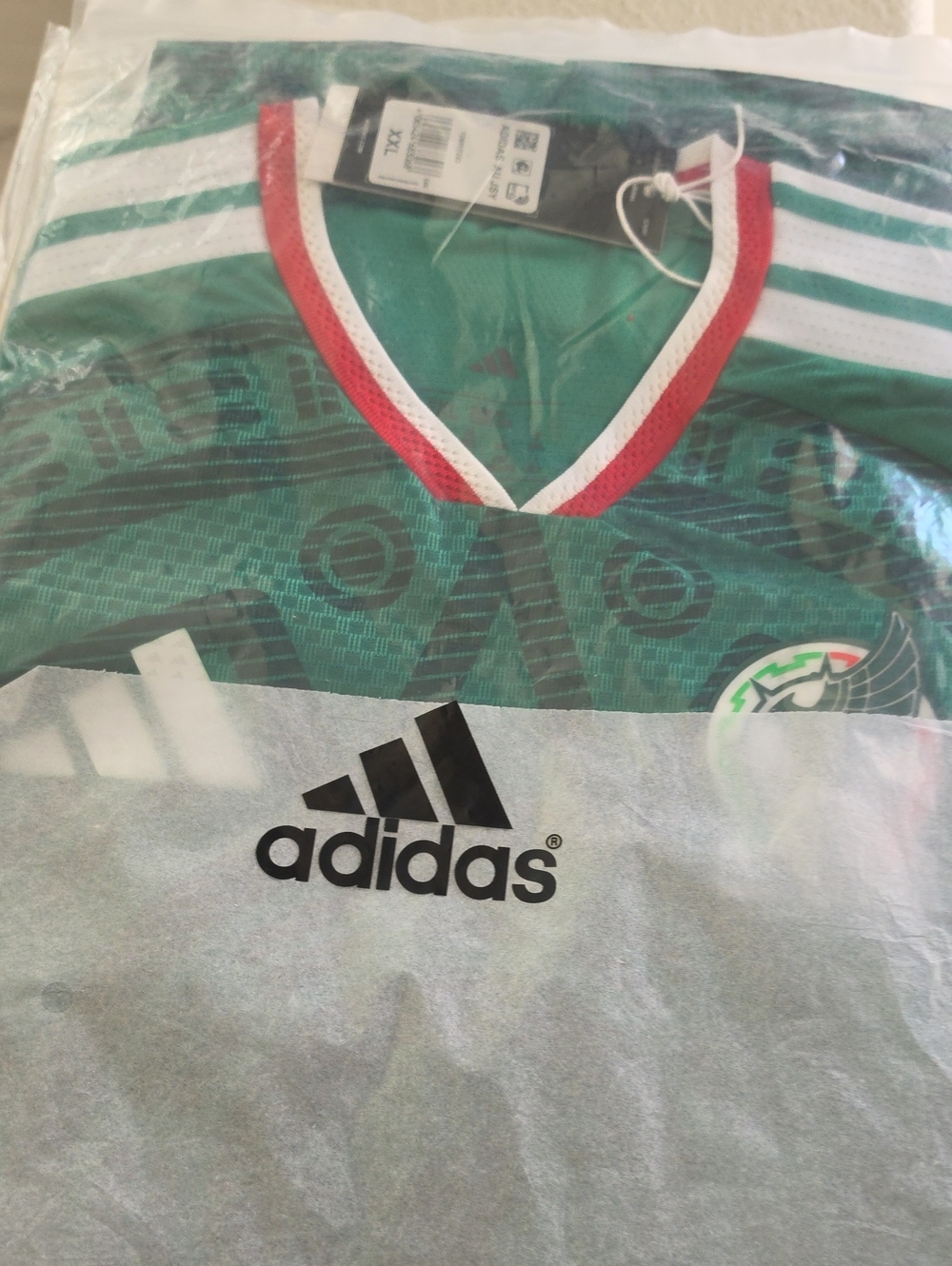 Green Soccer Jersey with Red and White Trim - Picture 1 of 11